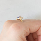 Anello a margherita vintage in oro giallo e bianco 9K con tanzanite (0.60ct ca.), anni ‘90
