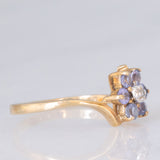 Anello contrarier con fiore in oro giallo 9K con tanzaniti (0.36ctw ca.) e diamante, anni ‘90