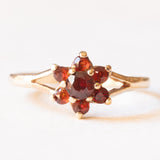 Anello a margherita vintage in oro giallo 9K con granati, anno 1979