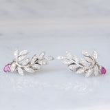 Orecchini vintage in oro bianco 18K con rubini (0.80ctw ca.) e diamanti (1ctw ca.), anni ‘90