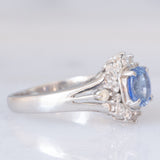 Anello margherita vintage in platino con zaffiro (0.75ct) e diamanti (0.31ctw), anni ‘80