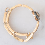 Braccialetto semirigido retrò in oro giallo 14K a argento con zaffiro (1ct ca.) e diamanti di taglio rosetta (0.36ctw ca.), anni ‘40/‘50