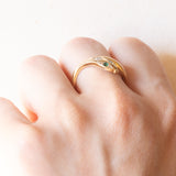 Anello a serpente vintage in oro giallo 18K con smeraldi e diamante di taglio brillante (0.02ct ca.), anni ‘70