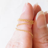 Collier vintage con catenina in oro giallo 18K e con ciondolo in oro giallo e bianco 14K con ametista (4.40ct ca.) e diamanti, anni ‘60/‘70
