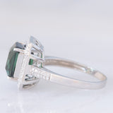 Anello a margherita vintage in oro bianco 18K con tormalina verde (2.80ct) e diamanti (0.40ctw), anni ‘2000