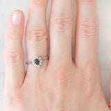 Anello a margherita vintage in platino con zaffiro (0.45ct ca.) e diamanti (0.14ctw ca.), anno 2006