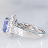 Anello a margherita vintage in platino con tanzanite (2.04ct) e diamanti di taglio brillante e baguette (1.35ctw), anni ‘90