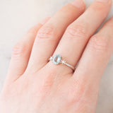 Trilogy vintage in oro bianco 18K con acquamarina (0.60ct ca.) e diamanti, anni ‘80