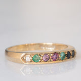 Anello “DEAREST” vintage in oro giallo 9K con diamante, smeraldi, ametista, rubino, zaffiro e tormalina, anno 1994