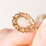 Collana vintage con catenina in oro giallo 9K e con pendente in oro giallo 9K con opale (1ct ca.), anno 1981