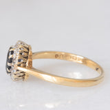 Anello a margherita vintage in oro giallo 9K con zaffiro (0.75ct ca.) e diamanti (0.10ctw ca.), anno 1981