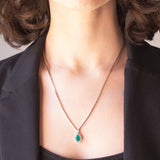 Collier in oro bianco 18K con smeraldo (1.20ct ca.) e diamanti di taglio brillante (0.58ctw ca.)