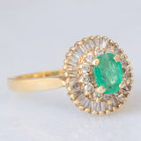 Anello ballerina vintage in oro giallo 14K con smeraldo (0.50ct ca.) e diamanti di taglio brillante e di taglio tapered (0.50ctw ca.), anni ‘70
