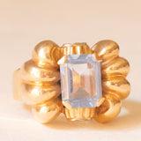Anello vintage a fiocco in oro giallo 18K con spinello azzurro sintetico (2.50ct ca.), anni ‘50