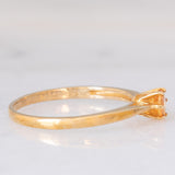 Solitario vintage in oro giallo 9K con spessartite (0.27ct ca.)