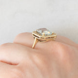 Anello a margherita vintage in oro giallo 14K con acquamarina (3.30ct ca.) e diamanti (0.22ctw ca.), anni ‘70