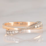 Anello vintage a fiocco in oro rosa e bianco 14K con diamanti
