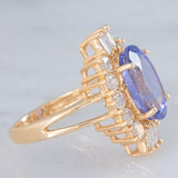 Anello ballerina vintage in oro giallo 14K con tanzanite (5.60ct ca.) e diamanti di taglio brillante e tapered (1.30ctw ca.), anni ‘80