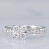 Anello a fiore vintage in platino con diamanti di taglio brillante (0.45ctw), anni ‘90