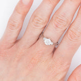 Trilogy vintage in platino con diamanti di taglio brillante (centrale di 1.02ct), anni ‘80