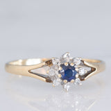 Anello a margherita vintage in oro giallo 9K con zaffiro (0.10ct ca.) e diamanti (0.08ctw ca.), anno 1987