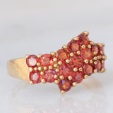 Anello in oro giallo 9K con pietre rosse
