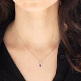 Collana vintage in platino con ciondolo con rubino (0.21ct) e diamanti di taglio brillante (0.24ctw)
