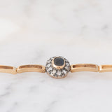 Braccialetto semirigido retrò in oro giallo 14K a argento con zaffiro (1ct ca.) e diamanti di taglio rosetta (0.36ctw ca.), anni ‘40/‘50