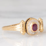 Anello doppio girevole in oro giallo 14K con rubino (0.20ct ca.)/smeraldo (0.14ct ca.) e diamanti, anni ‘80