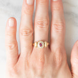 Anello doppio girevole in oro giallo 14K con rubino (0.20ct ca.)/smeraldo (0.14ct ca.) e diamanti, anni ‘80