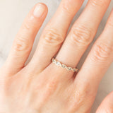 Anello intrecciato in oro bianco 9K con diamanti (0.05ctw ca.), anni ‘80