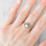 Anello a margherita antico in oro giallo 14K e argento con perla bianca e diamanti di taglio rosetta (0.13ctw ca.), primi del ‘900