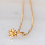 Collana vintage con ciondolo ad anello a margherita in oro giallo 18K con quarzo citrino e diamanti, anni ‘80