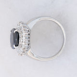 Anello a margherita vintage in platino con zaffiro (4.30ct) e diamanti (1.05ctw), anni ‘80