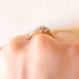 Anello a margherita vintage in oro giallo e bianco 14K con tormalina rosa (0.50ct ca.) e diamanti (0.08ctw ca.), anni ‘70