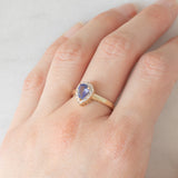 Anello a margherita vintage in oro giallo e bianco 9K con tanzanite (0.60ct ca.), anni ‘90