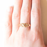 Anello vintage con infinito e cuori in oro giallo 14K