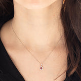Collana vintage in platino con ciondolo con rubino (0.26ct) e diamanti di taglio brillante (0.13ctw)