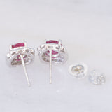 Orecchini a margherita vintage in platino con rubini (1.27ctw) e diamanti (0.50ctw), anni '80