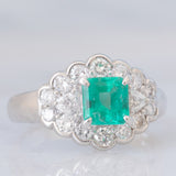 Anello a margherita vintage in platino con smeraldo colombiano (1.07ct) e diamanti (1.01ctw), anni ‘80