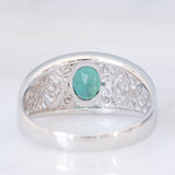 Anello a fascia in platino con tormalina verde (1.13ct) e diamanti (0.38ctw) e con lavorazioni a traforo, anni '90/anni '2000