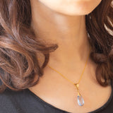 Pendente vintage in oro giallo 18K con topazio azzurro, anni ‘60