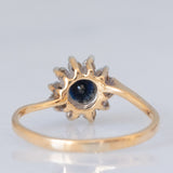 Anello a margherita vintage in oro giallo e bianco 9K con zaffiro (0.25ct ca.) e diamanti (0.10ctw ca.), anno 1981