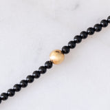 Collana moderna con onice e oro giallo 18K