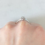 Solitario Art Déco in oro bianco 18K con diamante di taglio brillante (0.15ct ca.), anni ‘30