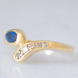 Anello a serpente vintage in oro giallo 14K con zaffiro e diamanti, anni ‘70