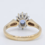 Anello a margherita vintage in oro giallo 9K con zaffiro (0.36ct ca.) e diamanti (0.12ctw ca.), anno 1989
