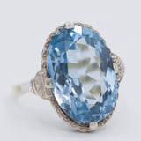 Anello da cocktail Art Déco in oro giallo 14K e argento con spinello azzurro (7.50ct ca.), anni ‘30