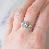 Anello a margherita vintage in platino con acquamarina (1.09ct) e diamanti (0.10ctw), anni ‘80/‘90