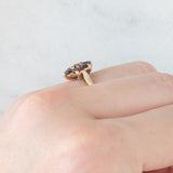 Anello a fiore vintage in oro giallo 9K con granati (0.70ctw ca.), anno 1966